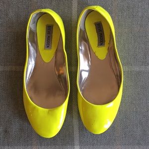 Neon yellow patent leather flats